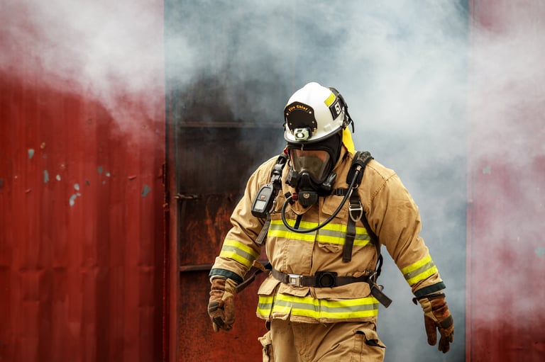 Firefighter in protective gear during emergency operation